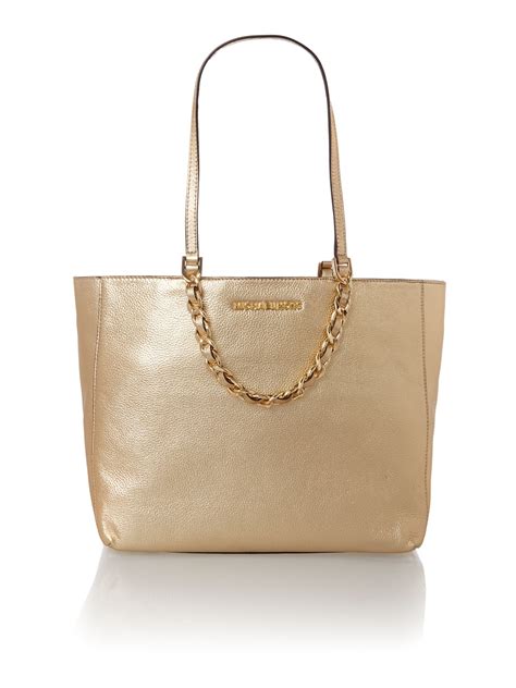 michael kors creme gold bag|Michael Kors gold tote bag.